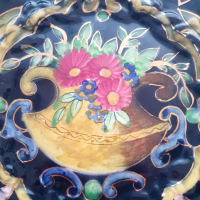 Zwart met goudkleurige schaal